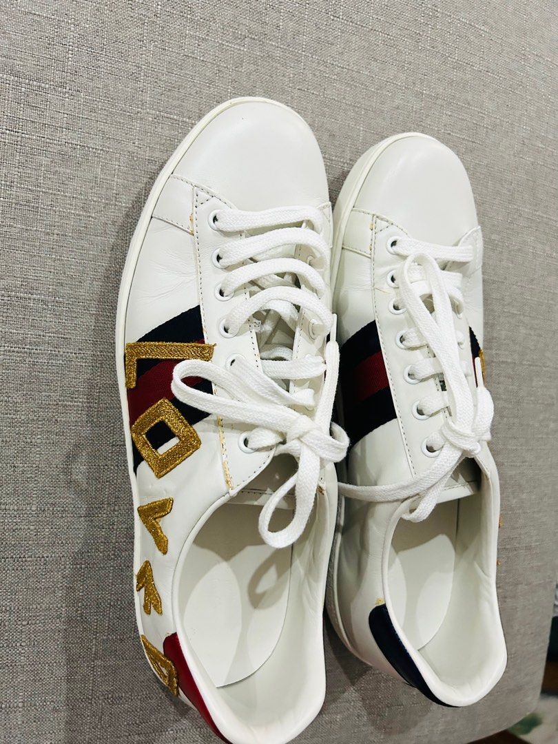 Gucci Ace “LOVED” sneakers (Category: Sneakers) located in Quezon City. Submitted by docmdeclutters (Listing ID 1300310474, Image 2). Description: Slightly negotiable.