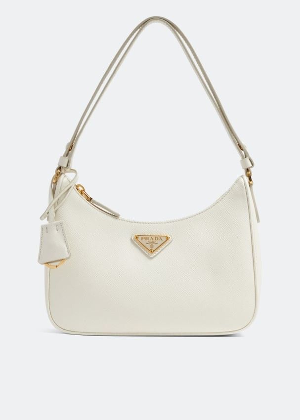 Prada Re-Edition Saffiano leather mini bag (Category: Luxury Bags & Wallets) located in Quezon City. Submitted by lovedbymaris (Listing ID 1300421840, Image 1). Description: barely used. stored in closet Only flaw: tiny crack glazing with dustbag only.