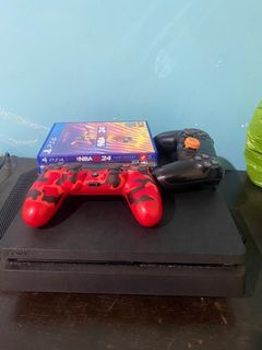 PS4 with 2 controllers and 3 games