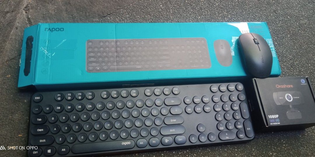 Rapoo wireless keyboard mouse and webcam (Category: Computer Keyboard) located in Las Pinas. Submitted by mommys_koleksyon011 (Listing ID 1300422623, Image 1). Description: bnew 1st bundle w/o mouse 500 2nd bundle complete set 1000 bnew lahat.