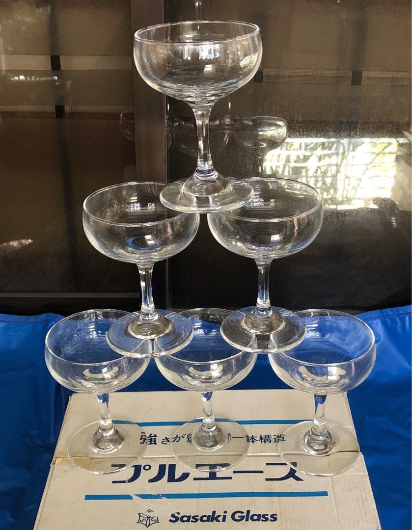 SASAKI CHAMPAGNE GLASS6’s (Category: Other Kitchenware & Tableware) located in Caloocan City. Submitted by e_o62059 (Listing ID 1300430717, Image 1). Description: Japan branded brand new in original box; pristine condition Size- D8cm x H 11.5cm .