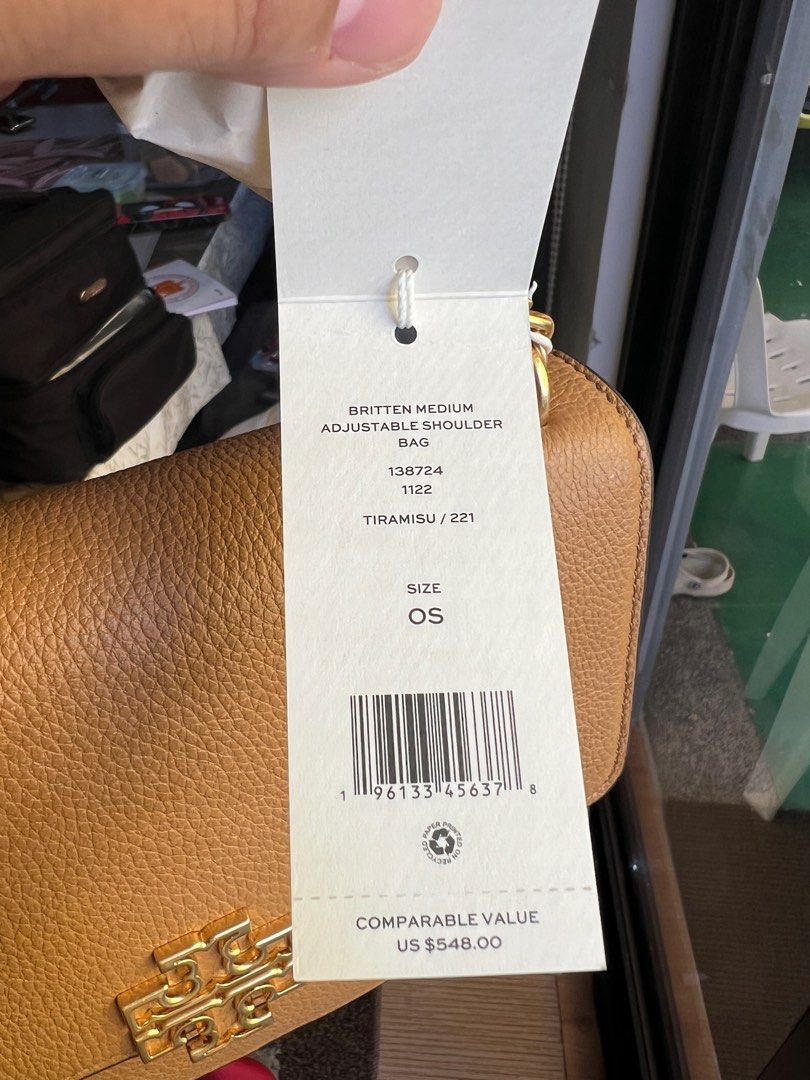 Tory Burch Britten Medium Adjustable Shoulder Bag (Category: Luxury Bags & Wallets) located in San Pedro. Submitted by misslumi (Listing ID 1300429160, Image 3). Description: 2 pcs ONHAND Brand New from US Outlet! 💯 original! Money back guarantee if proven fake! Inclusions: ✅Polyplastic, tags, paper bag ❌ dust bag - Solid shade pebbled shoulder bag with logo emblem - Genuine leather - Main flap with magnetic closure - Lined interior - Interior f