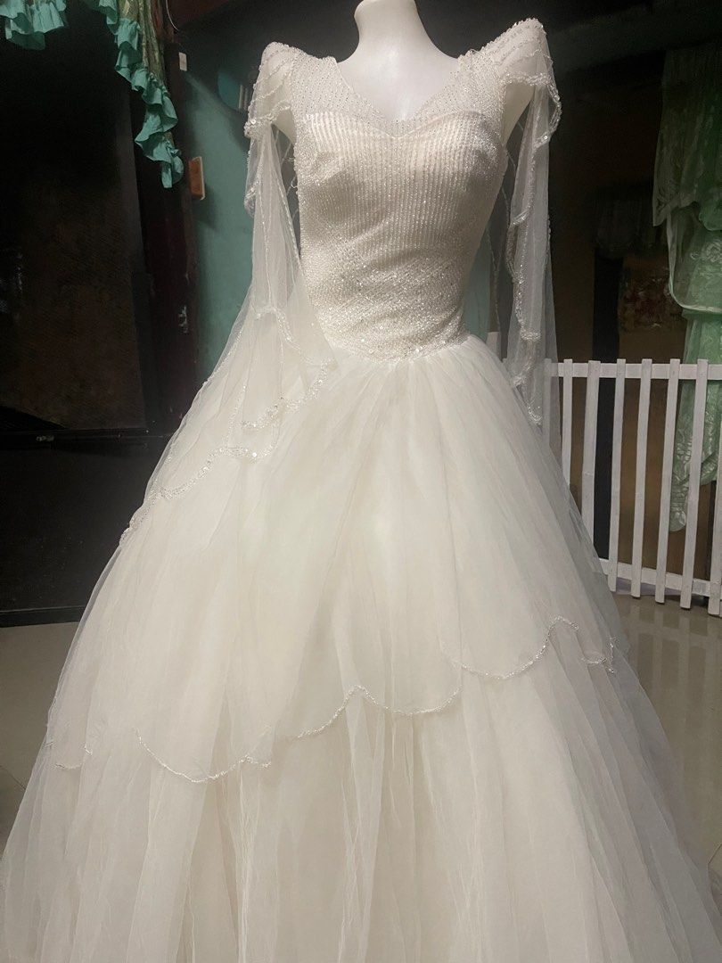Wedding gown with cape (Category: Evening dresses & gowns) located in Titay. Submitted by jhairalinn (Listing ID 1297638711, Image 3). Description: Super nice beaded wedding dress .
