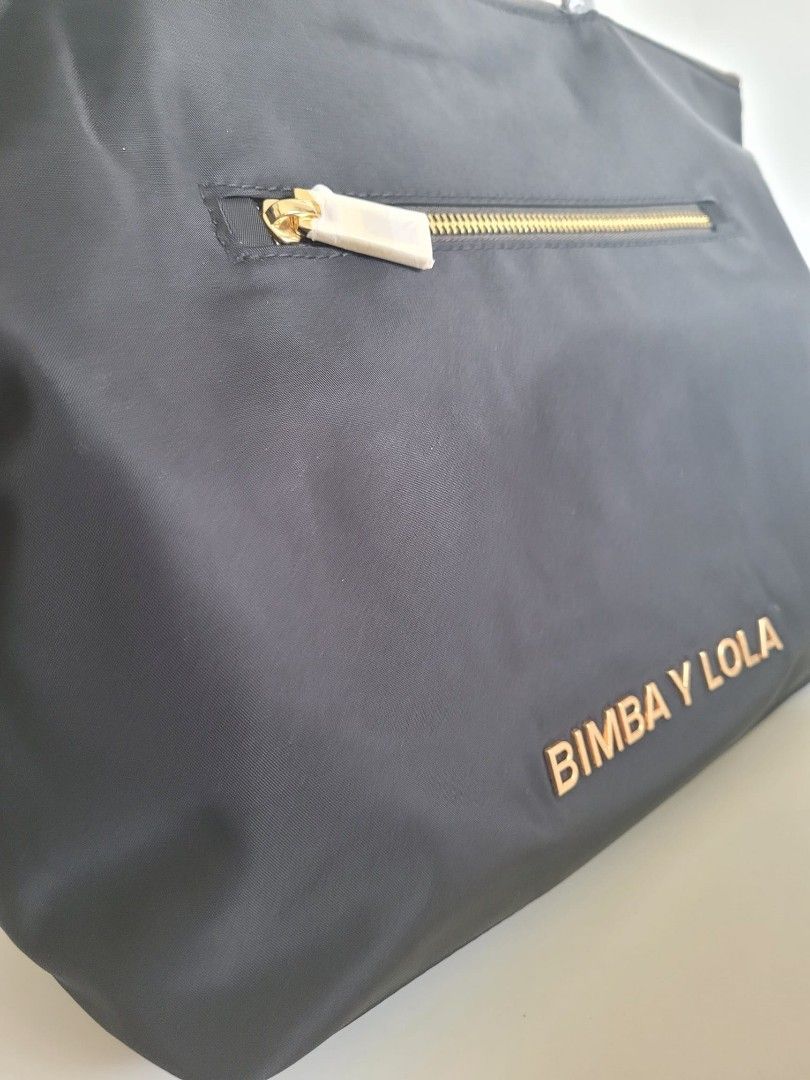 @reduce price@Bimba Y Lola tote bag, L size, can fit A4 book (Category: Tote Bags) located in Singapore. Submitted by goodhearthug (Listing ID 1300530951, Image 3). Description: 100% authentic brand NEW L size, can fit A4 book can meet at punggol to serangoon or by courier at $4.