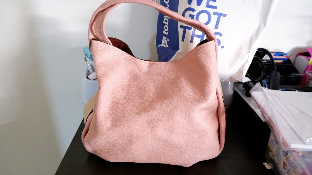 Coach Bandit Hobo Bag (Category: Luxury Bags & Wallets) located in Antipolo. Submitted by frustratedentrep (Listing ID 1300539517, Image 1). Description: Selling this Coach Bandit Hobo Bag, comes with a paper bag, no tag. Bnew, never used. rfs: not gonna use it. This bag feature a zipped pocket which snaps in on either side but can also be taken out and be used as a small bag on its own. So it's like buying 2 bags already. Store Price: 695usd Sel