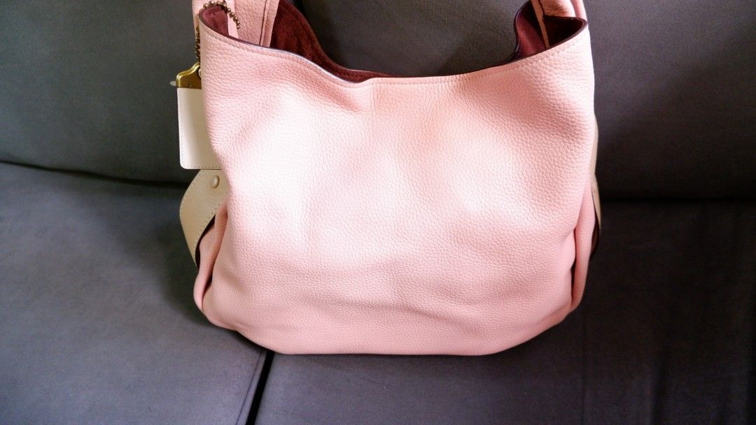 Coach Bandit Hobo Bag (Category: Luxury Bags & Wallets) located in Antipolo. Submitted by frustratedentrep (Listing ID 1300539517, Image 2). Description: Selling this Coach Bandit Hobo Bag, comes with a paper bag, no tag. Bnew, never used. rfs: not gonna use it. This bag feature a zipped pocket which snaps in on either side but can also be taken out and be used as a small bag on its own. So it's like buying 2 bags already. Store Price: 695usd Sel