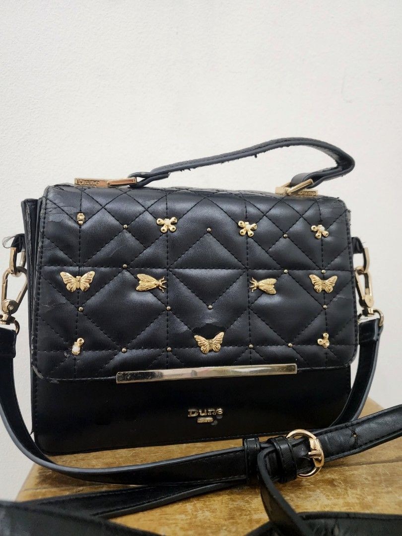 Dune London Bag (Category: Luxury Bags & Wallets) located in Quezon City. Submitted by jelsellit (Listing ID 1300528433, Image 3). Description: bought it for 6k selling for 2.5k lowered price to 900 purchased at Dune London BGC branch well used got flaws as shown in the photo, but can be restored i need to empty the cabinets for new items asap.
