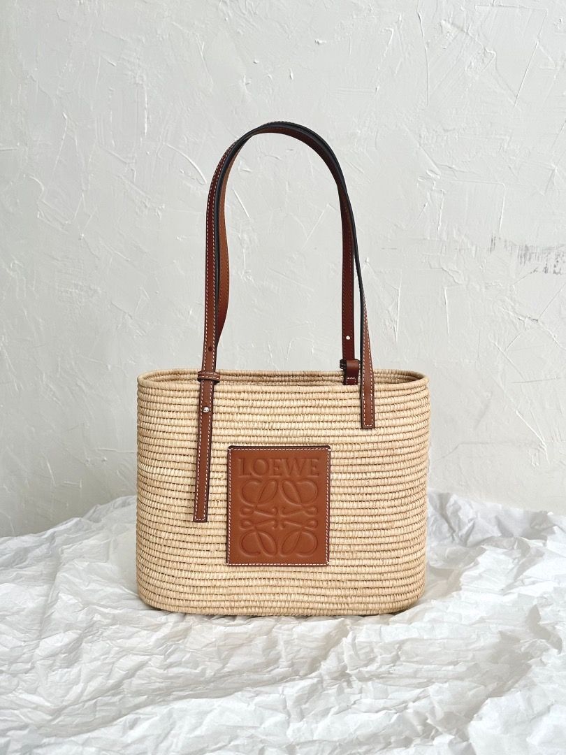 Loewe Basket Bag Square Raffia Tote (Category: Luxury Bags & Wallets) located in Manila. Submitted by designerarchives.ph (Listing ID 1300609192, Image 1). Description: Complete - box, dustbag, paperbag Perfect for summer 🌼🌴🥥🌊 Cheaper compared to others because of tax refund from Europe! Eta: 15 days 50% dp required Buyer will shoulder local sf Shipping: NCR - Grab/Lalamove Provincial - LBC.
