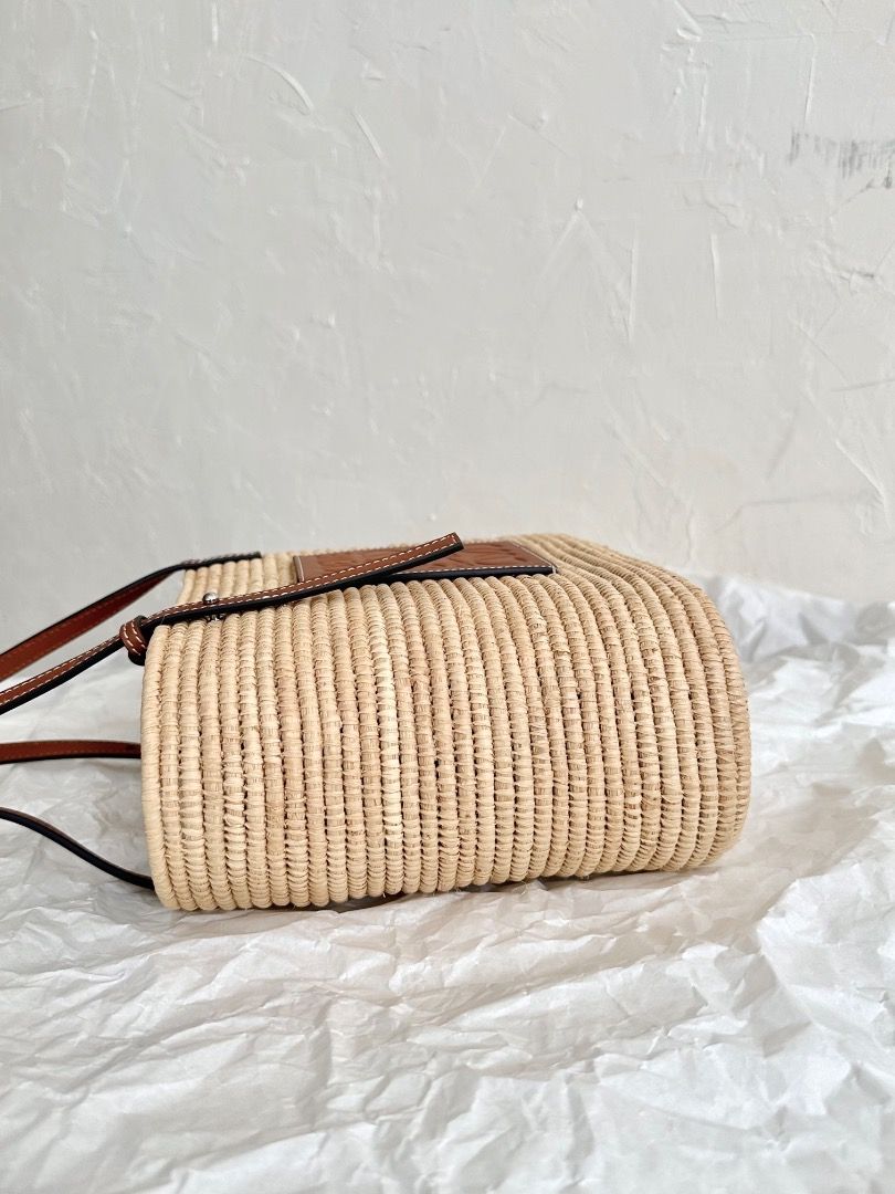 Loewe Basket Bag Square Raffia Tote (Category: Luxury Bags & Wallets) located in Manila. Submitted by designerarchives.ph (Listing ID 1300609192, Image 3). Description: Complete - box, dustbag, paperbag Perfect for summer 🌼🌴🥥🌊 Cheaper compared to others because of tax refund from Europe! Eta: 15 days 50% dp required Buyer will shoulder local sf Shipping: NCR - Grab/Lalamove Provincial - LBC.