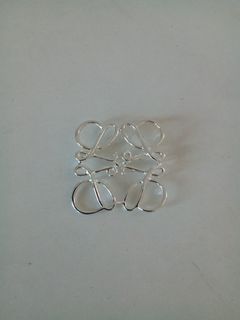 Loewe silver anagram brooch pin
