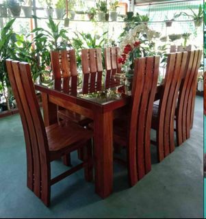 Mahogany Dining Set Table with tinted top glass and 8 solid mahogany Chairs 

No Issue! looks like Brandnew

GMA, Cavite pickup
