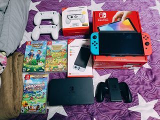 Nintendo switch Oled with Games Bnew