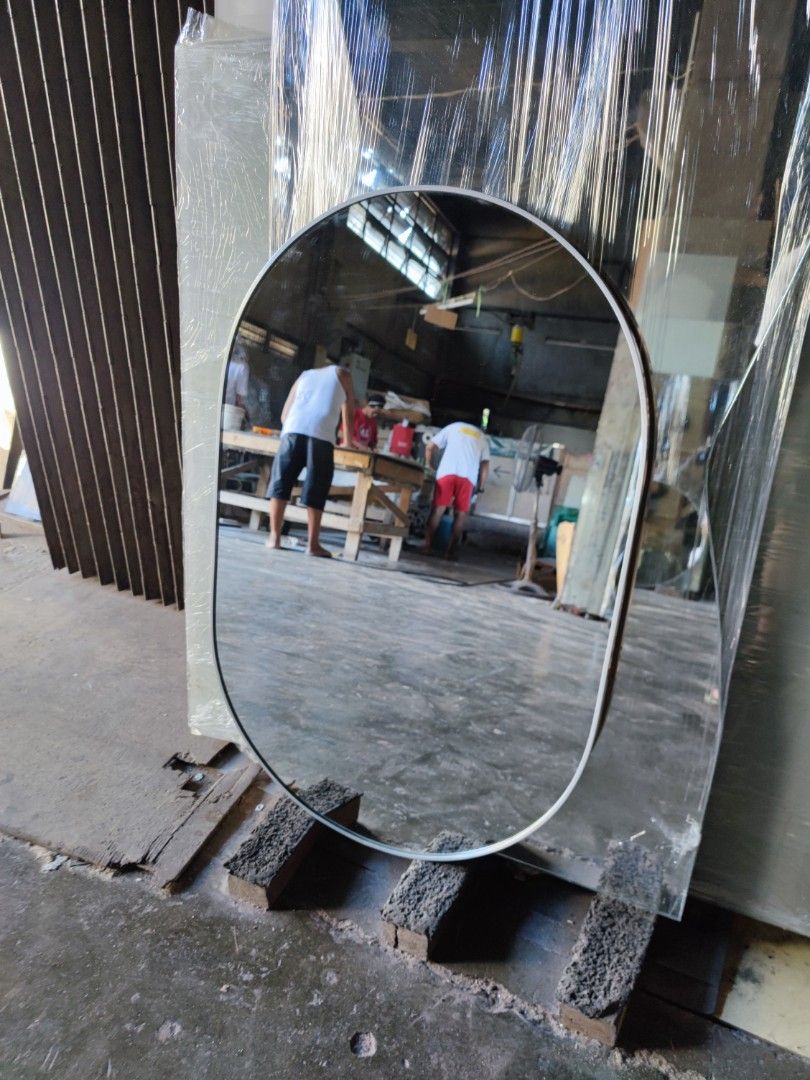 Oval mirror (Category: Mirrors) located in Malabon City. Submitted by mirrors.ph (Listing ID 1300437937, Image 3). Description: Oval mirror with silver aluminum frame and plywood backing. Using 6mm thick copper free mirror. Size: 2ft x 3ft P1620 Add P200 if with back hook Available colors gold, black, matte black, white and silver aluminum frame. Customize sizes and shapes are welcome..