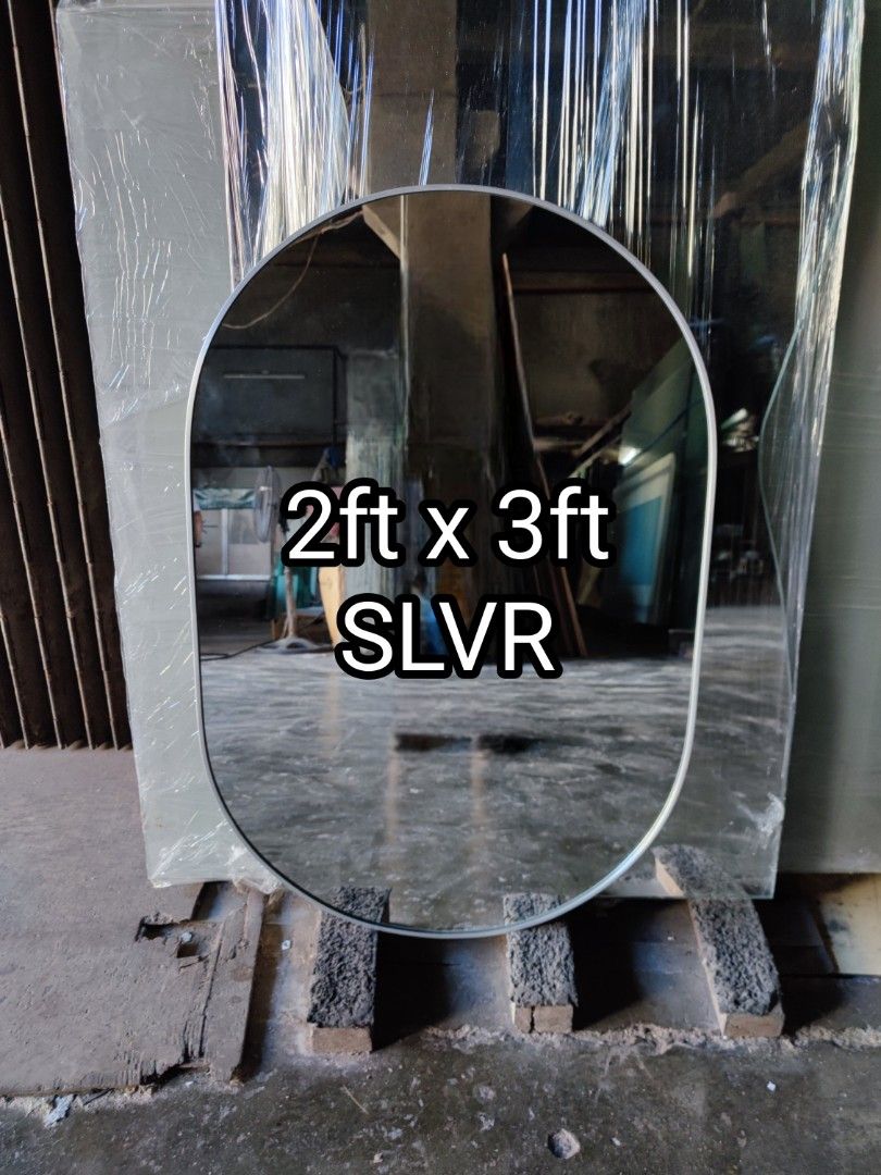 Oval mirror (Category: Mirrors) located in Malabon City. Submitted by mirrors.ph (Listing ID 1300437937, Image 1). Description: Oval mirror with silver aluminum frame and plywood backing. Using 6mm thick copper free mirror. Size: 2ft x 3ft P1620 Add P200 if with back hook Available colors gold, black, matte black, white and silver aluminum frame. Customize sizes and shapes are welcome..