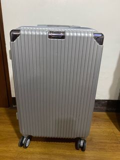 Silver medium luggage bought in vietnam