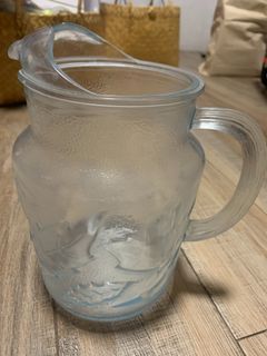 [20]	open glass pitcher