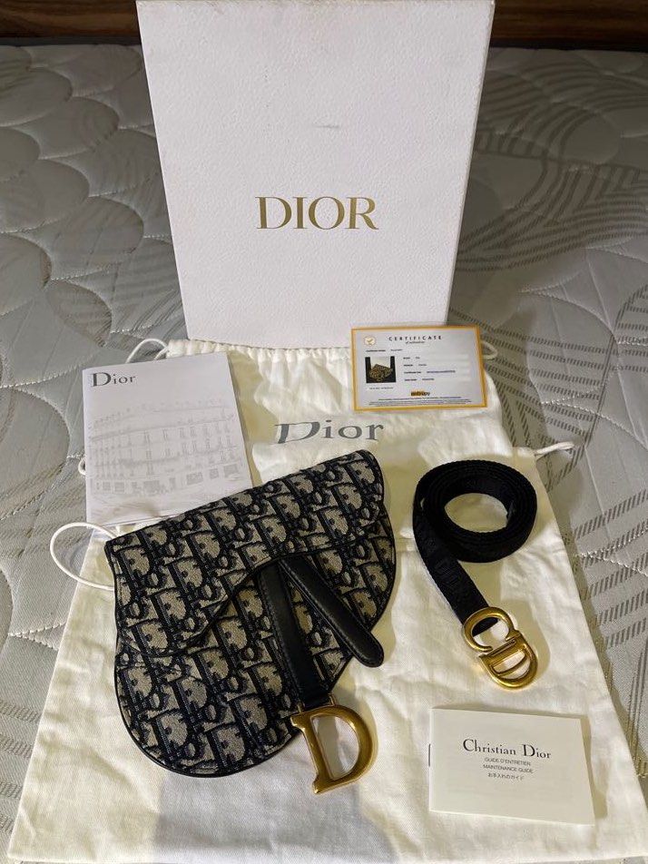 Christian Dior Saddle Belt Pouch (Category: Luxury Bags & Wallets) located in Pasig City. Submitted by ecrz19 (Listing ID 1132447003, Image 1). Description: Christian Dior Saddle Belt Pouch Blue Dior Oblique Jacquard SRP is 115,000 PHP Iconic Saddle Bag from the House of Dior Good as new, used once only and just kept in the closet, no issues. Can be worn multiple ways, if you have a strap or chain, it can be worn as crossbody, i can send pics of 
