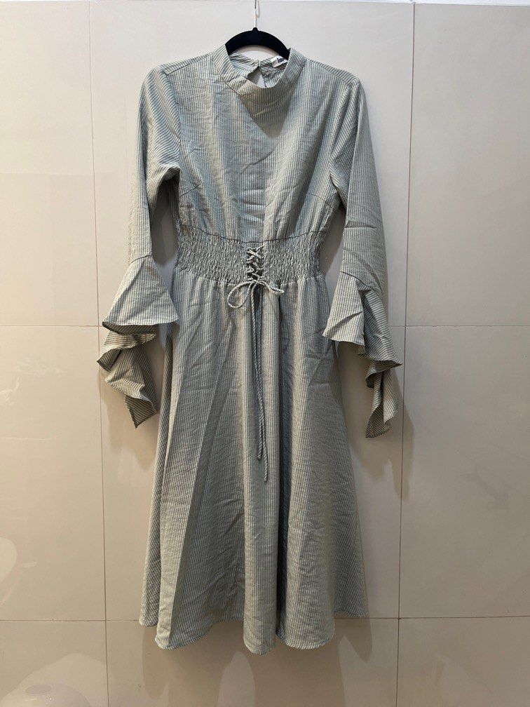 Garterized dress with bell sleeves (Category: Dresses) located in Manila. Submitted by ar_things (Listing ID 1300685550, Image 1). Description: RFS: Extreme decluttering hence all items are at its lowest price. Condition of item is stated above. Please check all the photos for details. 😊.