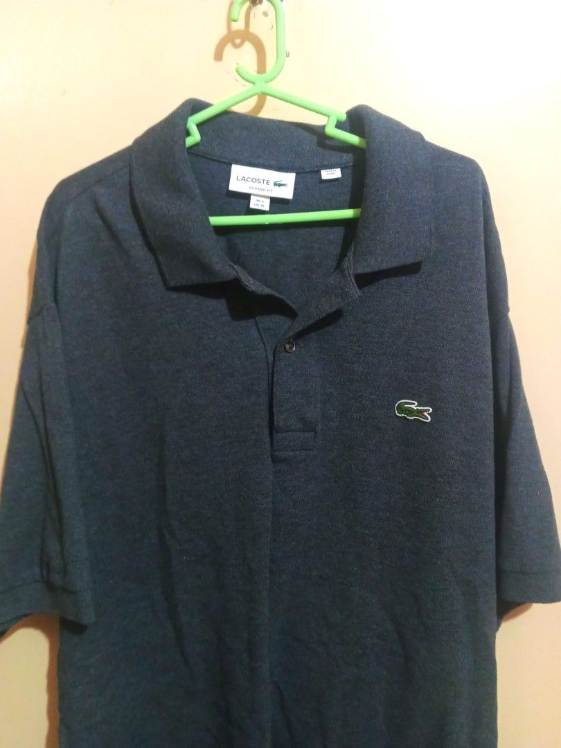 Lacoste Classic Fit Polo Shirt (Category: Tshirts & Polo Shirts ) located in Binan City. Submitted by HomeGoodiesPH (Listing ID 1300624486, Image 1). Description: Lacoste Classic Fit - Size XL on Tag.