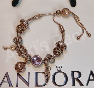 Pandora Rose bracelet and charms