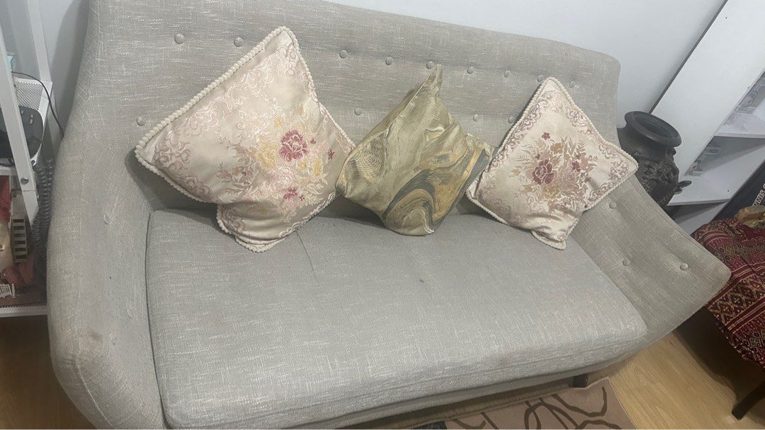 Rush Sale (Category: Sofas) located in Pasig City. Submitted by mishybelle (Listing ID 1300621714, Image 1). Description: Aesthetically pleasing. Issue: minor scratch shown on the photo Throwpillows not included. But will sell it at ₱100 each. Free sofa cover .