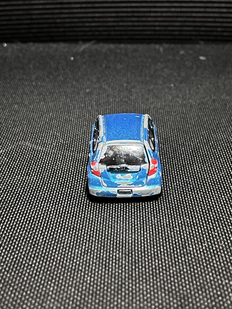 Tomica Honda Jazz Ge rare (Category: Vehicle & Diecast Models) located in Paranaque City. Submitted by Sharkfinds (Listing ID 1300746495, Image 3). Description: Tomica honda jazz GE rare - Condition is as is - working back door - Wheel suspension working - Location las pinas.