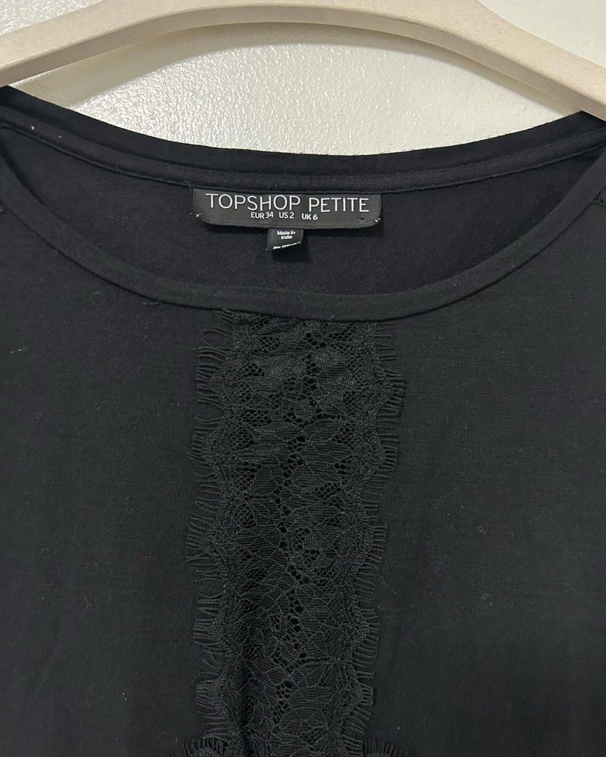 Topshop Lace T-shirt (Category: Shirts) located in Pasig City. Submitted by shopmaycab (Listing ID 1300722614, Image 2). Description: Front detail is lace sheer.