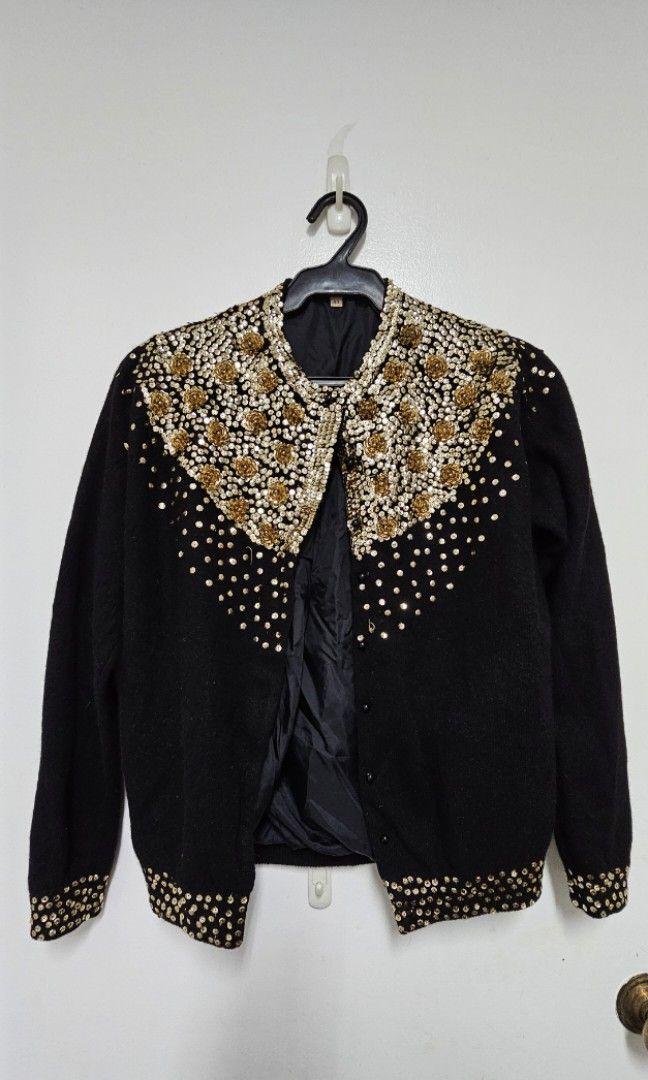Vintage Black & Gold Cardigan (Category: Coats, Jackets and Outerwear) located in Paranaque City. Submitted by jaymiedg (Listing ID 1300619612, Image 1). Description: Vintage Black Cardigan with Gold Sequins No label/tag Intricate gold sequin flowerettes Cardigan with lining Fits Small - Medium Pick up location: Weekdays: Makati Weekend: Pque.