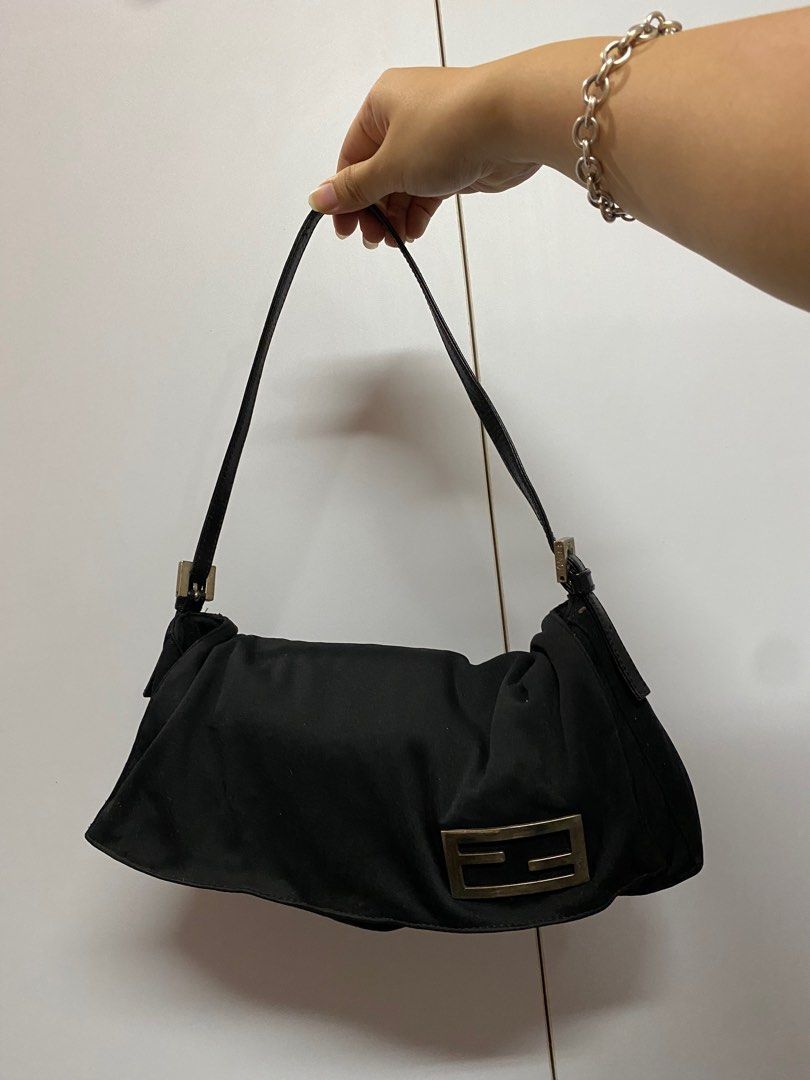 AUTHENTIC Fendi Neoprene Black Rectangle Baguette SHW (Category: Luxury Bags & Wallets) located in Quezon City. Submitted by closetofcoco (Listing ID 1296415061, Image 1). Description: GUARANTEED AUTHENTIC PM FOR INQUIRIES NO LOW BALLING.