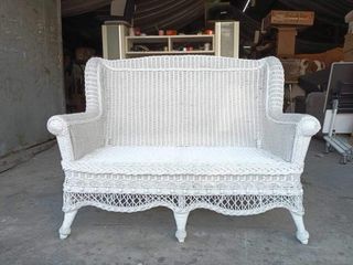 Elegant white rattan sofa