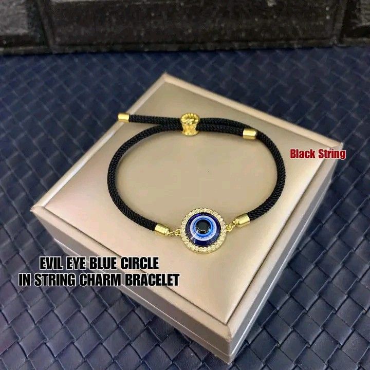 Evil eye circle in string bracelet (Category: Bracelets) located in Manila. Submitted by luckycharmsonlineshopping_ (Listing ID 1296439390, Image 2). Description: 💥 RESTOCK BEST SELLER ❤️ EVIL EYE BLUE CIRCLE IN STRING CHARM BRACELET ❤️ 🧿 THE EVIL EYE CAN BLESS THE OWNER’S SAFETY AND HEALTH , AN AMULET THAT BRINGS GOOD LUCK . WEAR THIS EVIL EYE TO PROTECT YOU AND YOUR FAMILY TO NEGATIVE ENERGY. 🧿 EVIL EYE - The Evil Eye is a very powerful, tra