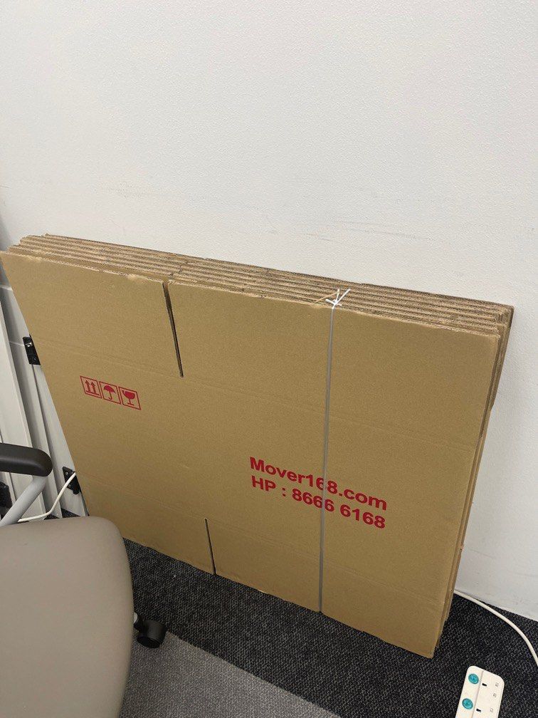 Moving boxes (Category: Shelves, Cabinets & Racks) located in Singapore. Submitted by hguy30 (Listing ID 1296566541, Image 2). Description: All are new, one or two are taped before but consider brand new Size are 53cm by 40cm by 40cm Total 20 PCs.