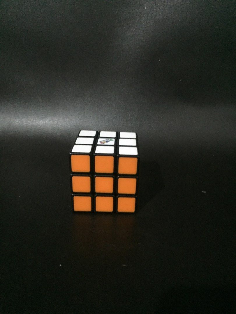 Original Rubiks Cube (Category: Board Games & Puzzles) located in Makati City. Submitted by manimoo210 (Listing ID 1296563174, Image 2). Description: Bought this around 2018, with my pamasko. Bought it for 500 now a days this retail mga 600+. Has a bit of scratches and the icon in the white side is kind of fading but still playable.