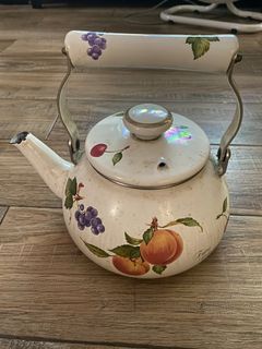[22]	vintage white floral kettle (used in induction stove)