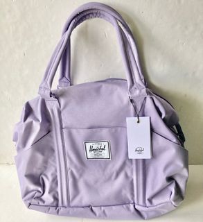 Authentic Herschel is The Strand Duffle Duffel Hand Carry Bag  for Traveling in Lilac or Lavender Light Purple or Violet