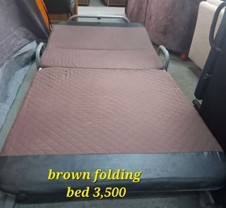 Brown folding bed