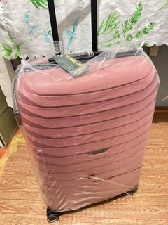 Pink luggage medium