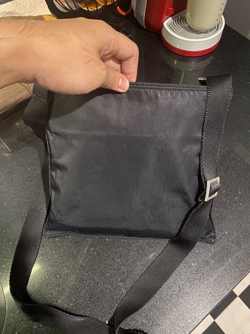 Prada sling nylon (Category: Luxury Bags & Wallets) located in Bocaue. Submitted by mnlauththrift (Listing ID 1300875240, Image 2). Description: .