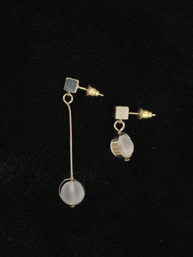 Uneven earrings on sale