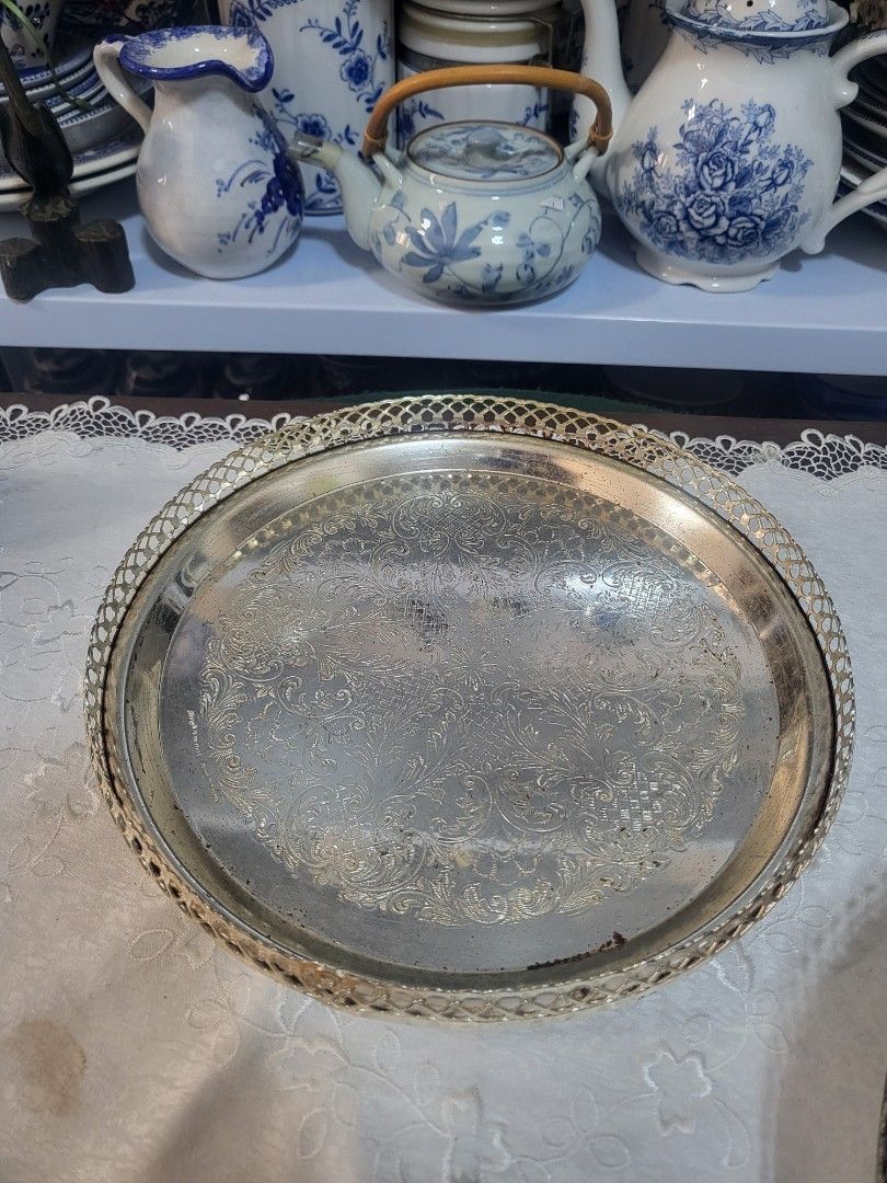 Vintage silver Plated round tray (Category: Dinnerware & Cutlery) located in Bulacan. Submitted by YourCollection (Listing ID 1300787253, Image 1). Description: Vintage silver Plated tray 3pcs available ₱800 each Measurements H 1.5" D 9".