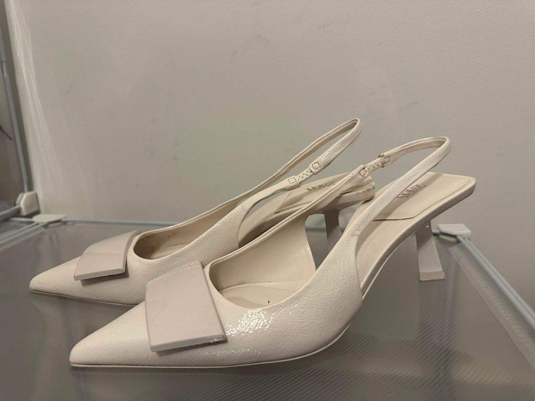 ZARA White Heeled Slingback Shoes (Category: Heels) located in Mandaluyong City. Submitted by darachii (Listing ID 1300815829, Image 3). Description: ZARA White Heeled Slingback Shoes - size 35 (can fit size 36) - good as new! - used once only - condition: 10/10 no issues - bought this for ₱4.4k+ selling it for only ₱1.3k! .