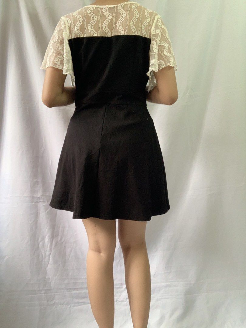 Black and white lace sleeve with side slit (Category: Dresses) located in Manila. Submitted by reduxarchives (Listing ID 1296725078, Image 3). Description: Black and white lace sleeve with side slit - needs an inner short/ you can match this up with stockings M B: 34-36” W: 28-30” L: 30”.