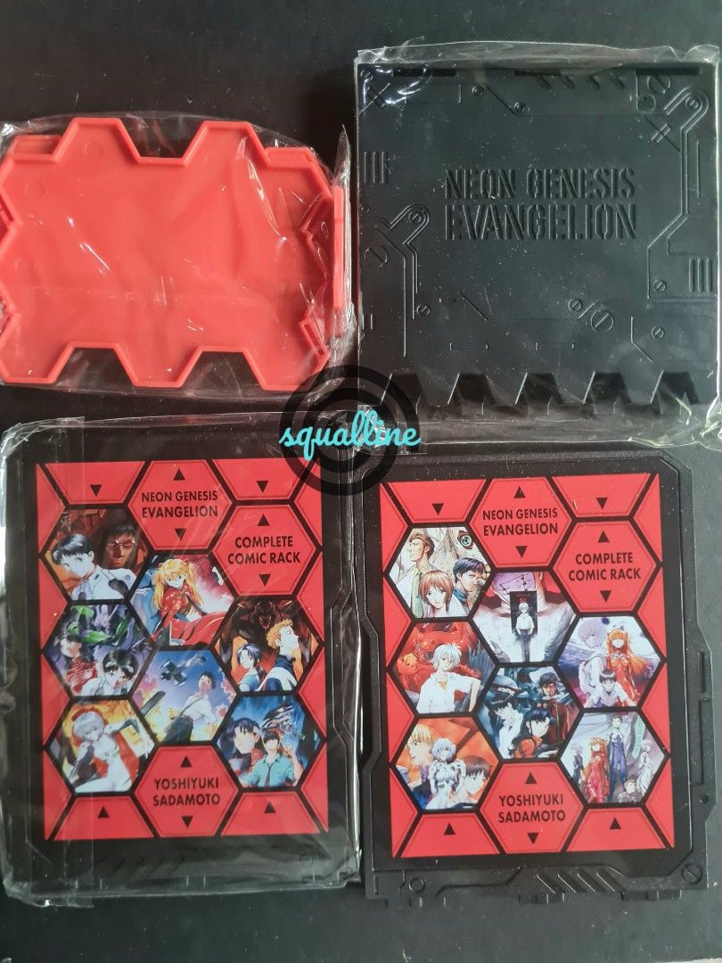 Neon Genesis Evangelion - Complete Comic / Manga Rack (Category: Comics & Manga) located in Pasig City. Submitted by squalline (Listing ID 1296727502, Image 1). Description: - rare / limited edition Evangelion merch - used as bookend for manga /comics - great decoration if you collect Evangelion merch - The rack has Yoshiyuki Sadamoto's illustrations. - material: plastic - marked as "like new" because the box isn't 100% mint. I never used the rac