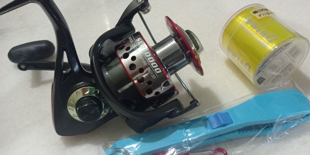 SLR10000 spinning reel with others, Sports Equipment, Fishing on Carousell