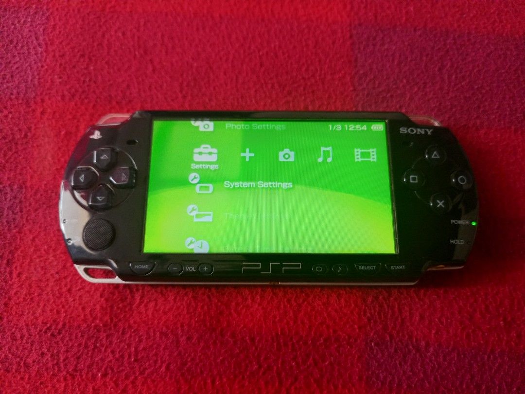 Sony PSP2000 Slim Black with 128GB Package (Category: PlayStation) located in Manila. Submitted by simplicito (Listing ID 1296645318, Image 3). Description: PSP2000 Black Features: Smooth and Presentable In Good Gaming Condition Latest 6.61 Pro-C2 Infinity CFW Installed Can Play Downloaded Game Package include: PSP2000 Unit Memory Stick with games Airfoam Pouch Case 220V Charger Crystal Case.