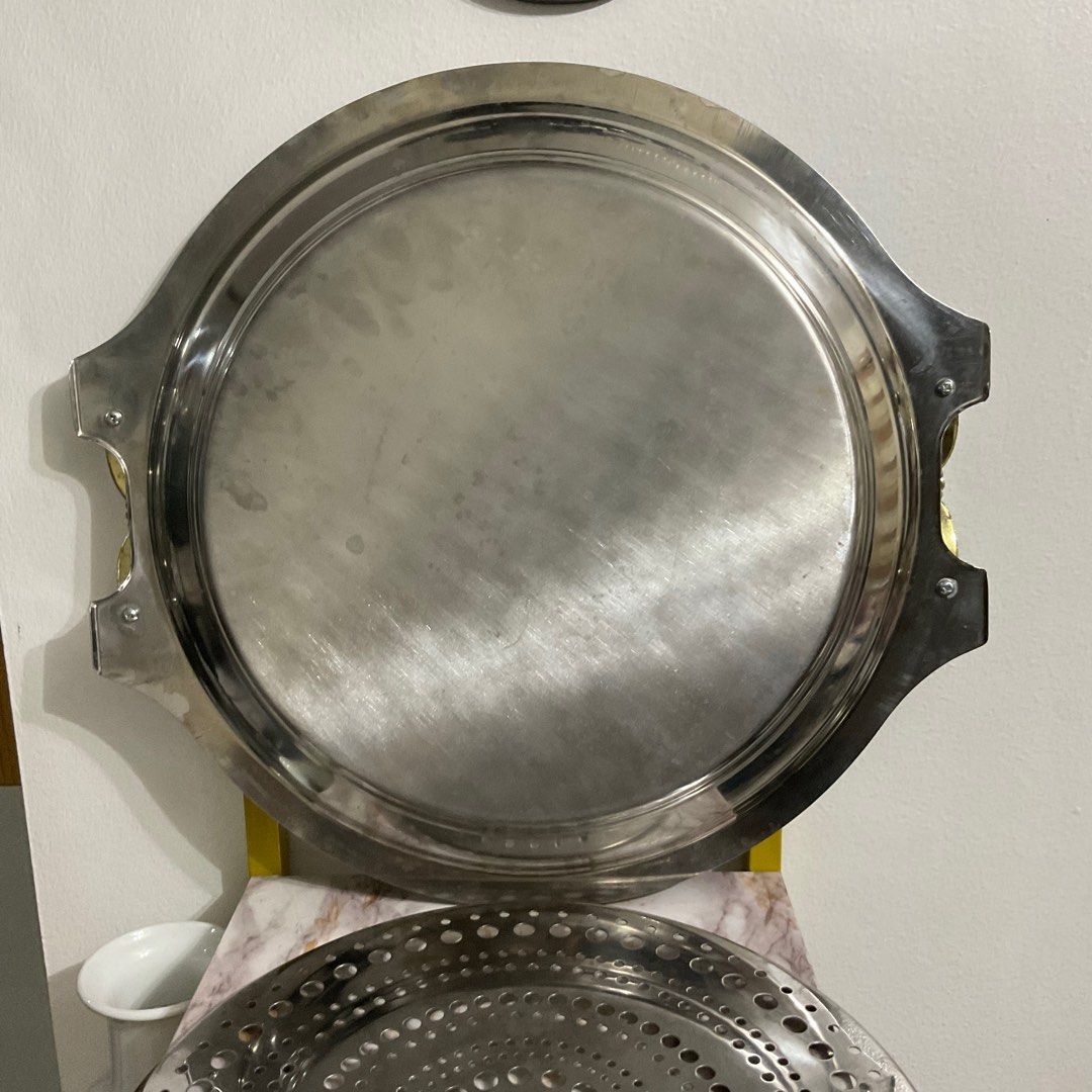 Stainless fruit/food server tray (Category: Other Kitchenware & Tableware) located in Caloocan City. Submitted by e_o62059 (Listing ID 1296730457, Image 3). Description: Japan brand,in original box;gold handle color fully intact;unused; no rust;stainless Issue -watermark due to cleaning and minor scratches due to prolong storage TRAY Size- 35cm x 37.5cm x 2.8cm (w/o handle) STRAINER size- 27cm.