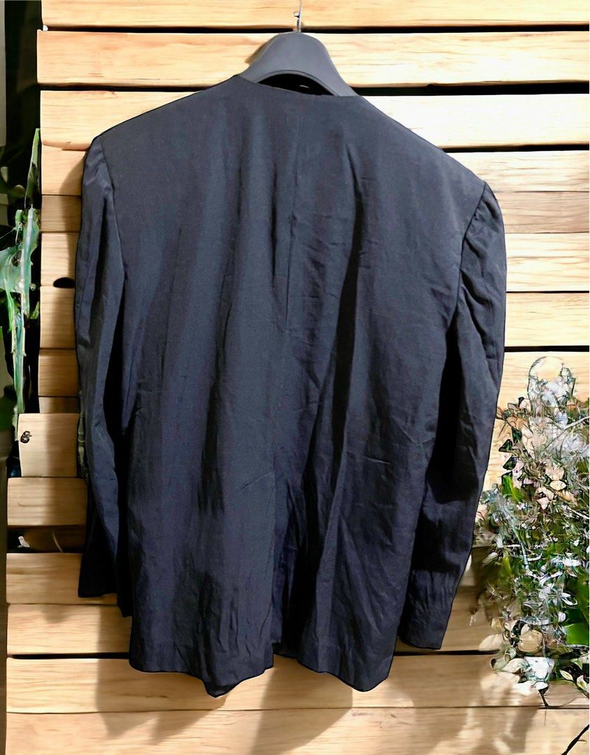 Black Women’s Long Blazer (Category: Coats, Jackets and Outerwear) located in Makati City. Submitted by mpr3rd (Listing ID 1296785305, Image 2). Description: Unbranded and custom-made by a tailor. Used in a party and kept. Needs ironing. Shoulder pads are prominent and can also be worn by a man (unisex). Think oppa attending an evening event. 😁 Shoulder width - 19” Chest width - 22” Length - 33”.