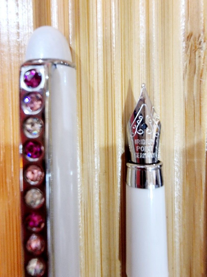 Fountain Pen (Category: Stationery & School Supplies) located in Mandaluyong City. Submitted by selleyo (Listing ID 1296826352, Image 1). Description: Metal Fountain Pen with Rhinestone Design...With free Ink Refill Black Color.