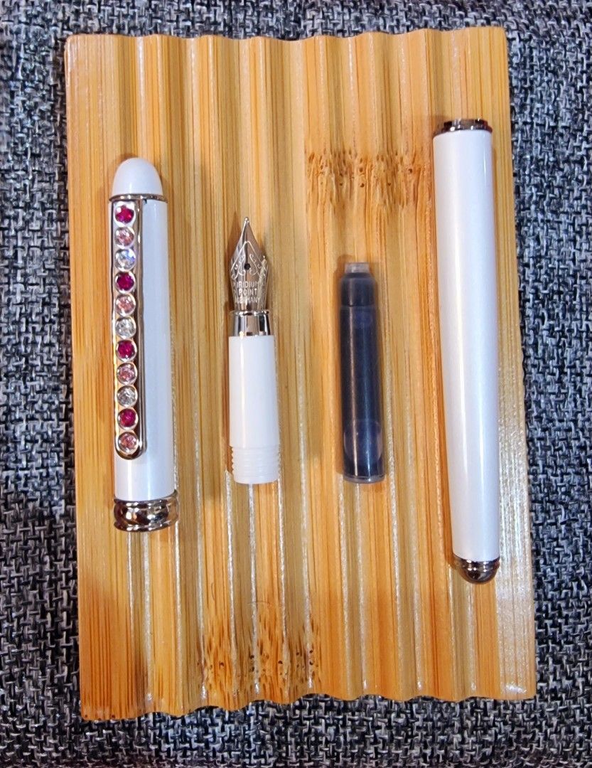 Fountain Pen (Category: Stationery & School Supplies) located in Mandaluyong City. Submitted by selleyo (Listing ID 1296826352, Image 2). Description: Metal Fountain Pen with Rhinestone Design...With free Ink Refill Black Color.