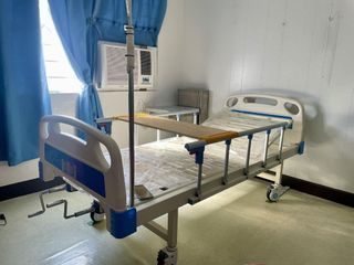 Hospital Bed with IV Pole and Table